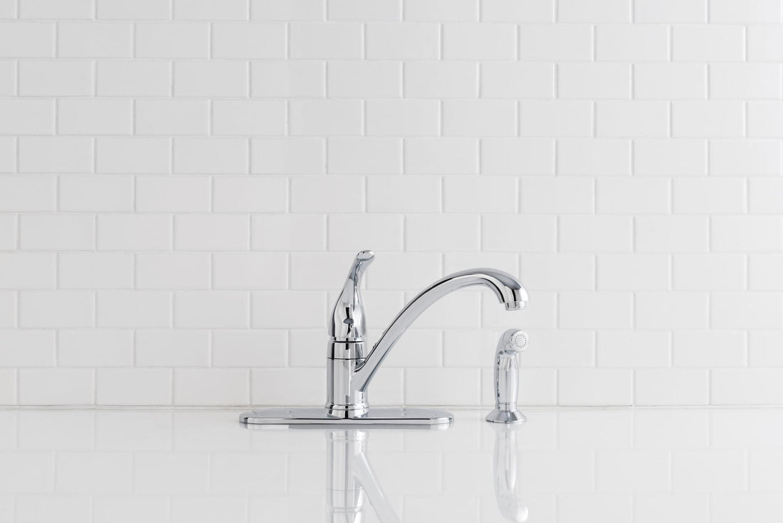 MOEN Torrance CA87480 Low-Arc Single-Handle Standard Kitchen Faucet with Side Sprayer in Chrome