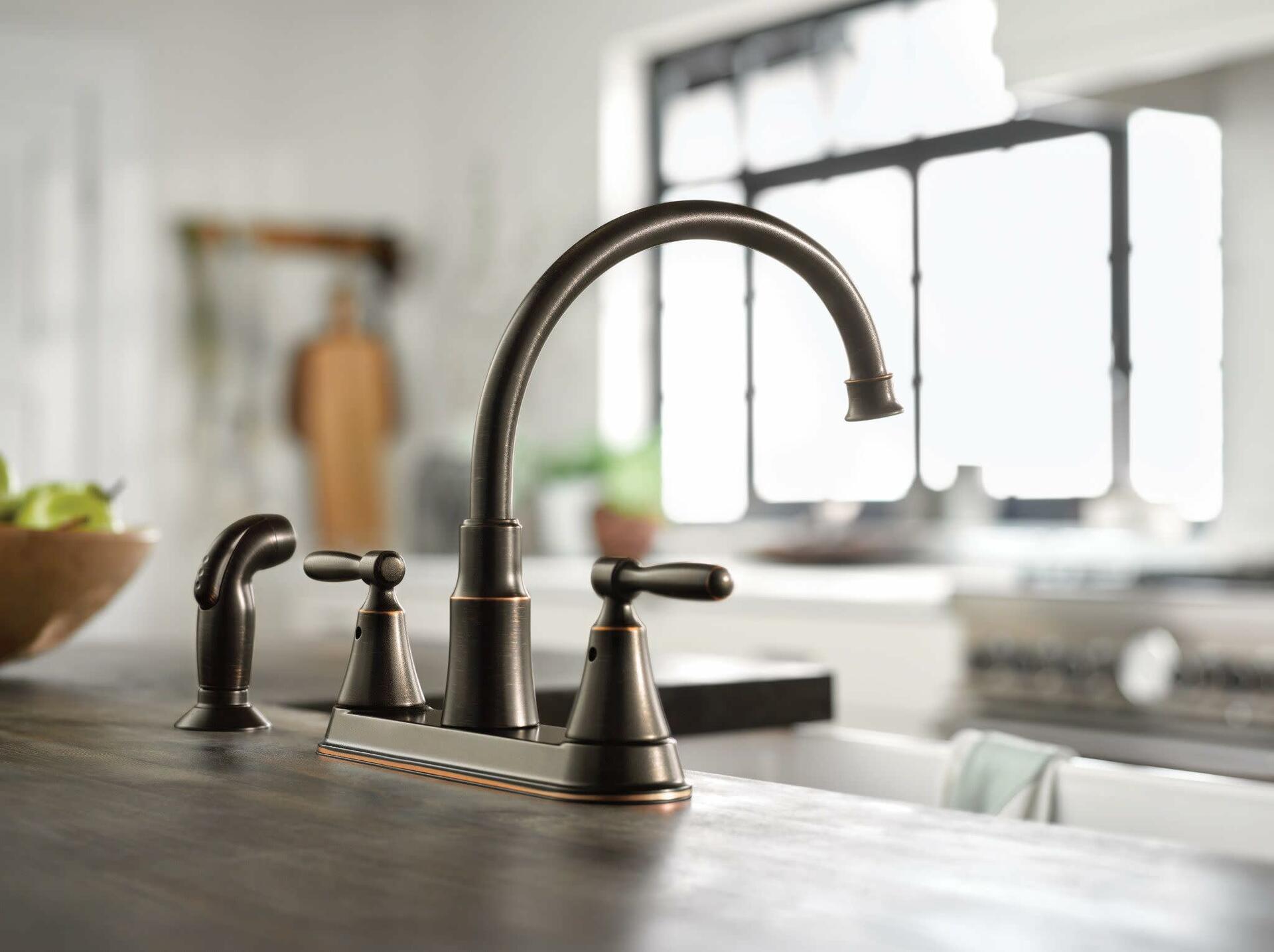 MOEN Hutchinson 87048BRB Two-Handle Kitchen Sink Faucet with Side Spray in Medterranean Bronze - Like New