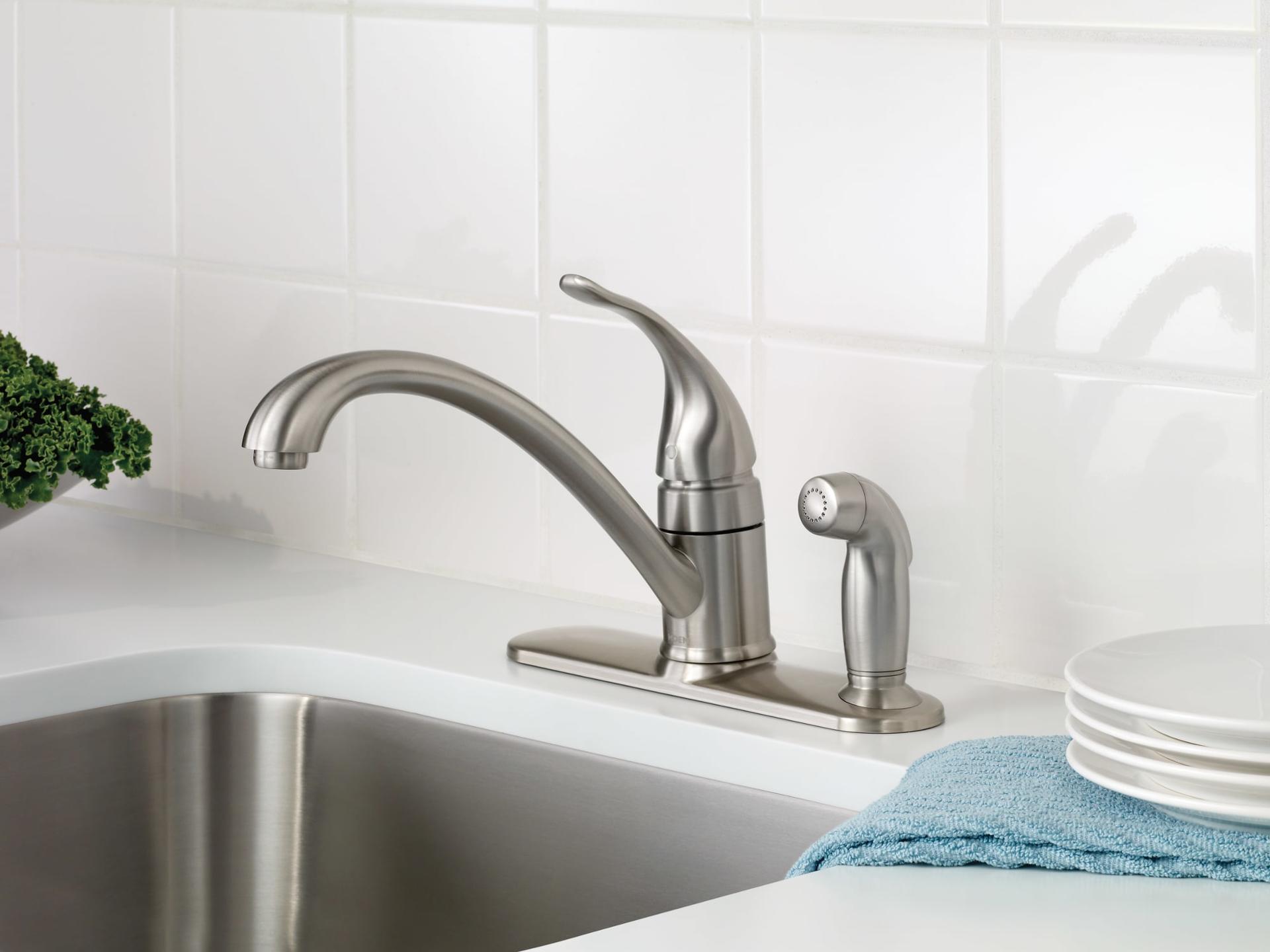 MOEN Torrance CA87484SRS Single-Handle Low-Arc Standard Kitchen Faucet with Side Sprayer on Deck in Spot Resist Stainless