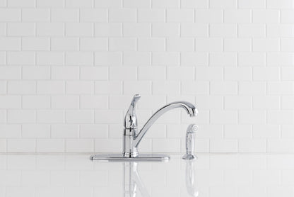 MOEN Torrance CA87480 Low-Arc Single-Handle Standard Kitchen Faucet with Side Sprayer in Chrome