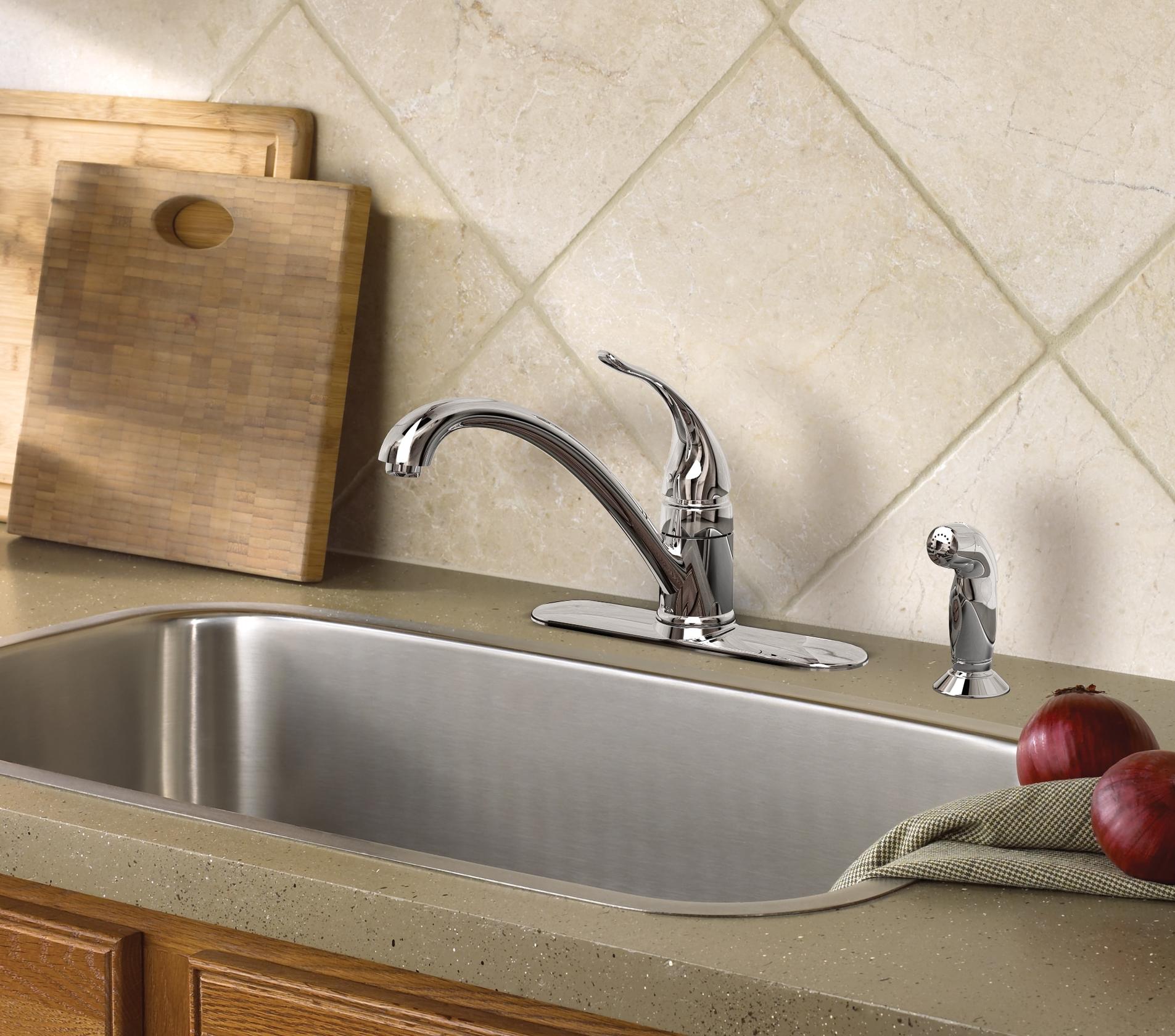 MOEN Torrance CA87480 Low-Arc Single-Handle Standard Kitchen Faucet with Side Sprayer in Chrome