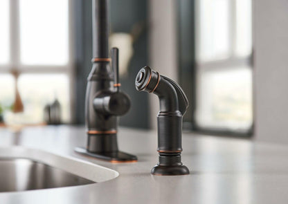 MOEN Noell 87506BRB Single-Handle Standard Kitchen Faucet with Side Sprayer in Mediterranean Bronze