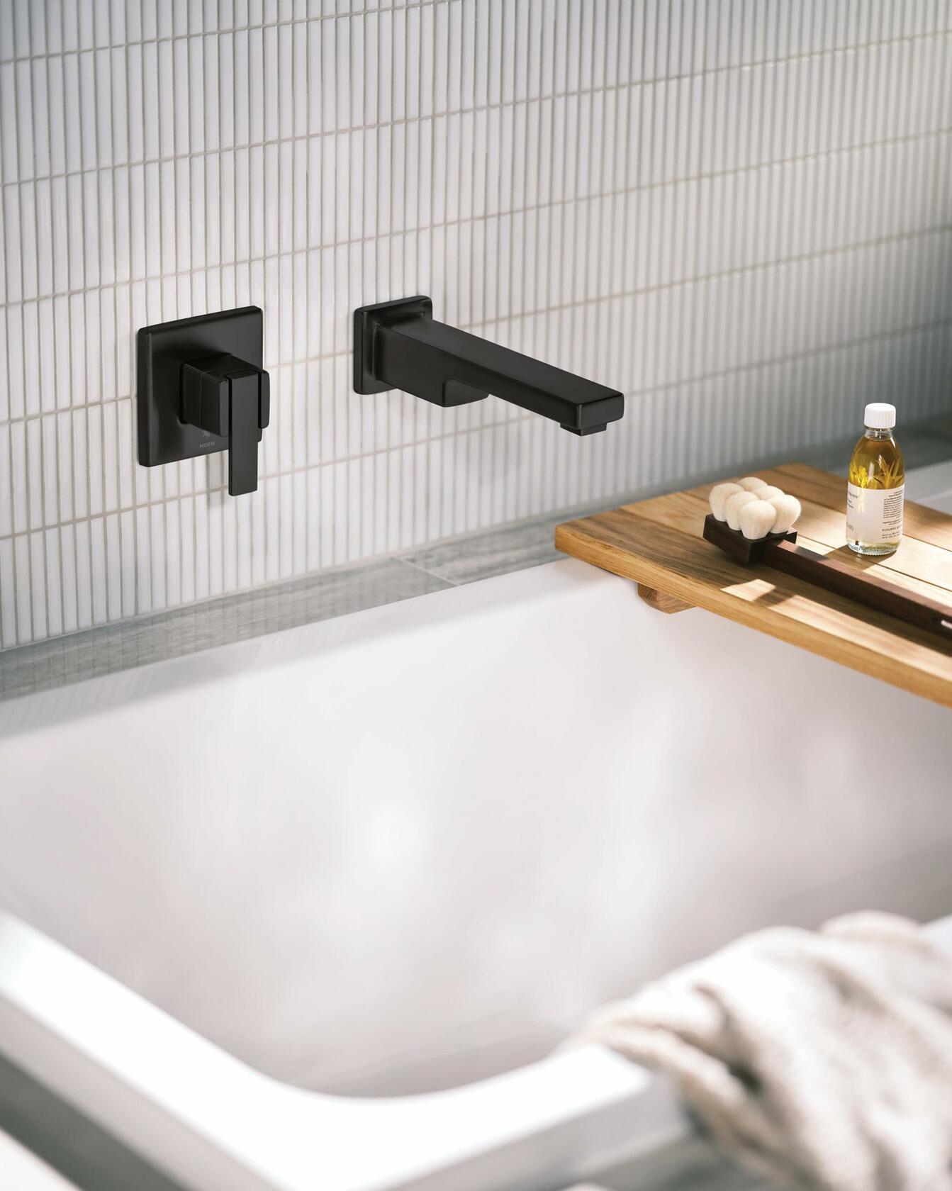Moen 90 Degree Matte Black Single Handle Wall Mount Tub Filler High Flow Tub Faucet with 10" Spout Reach, WTS911BL