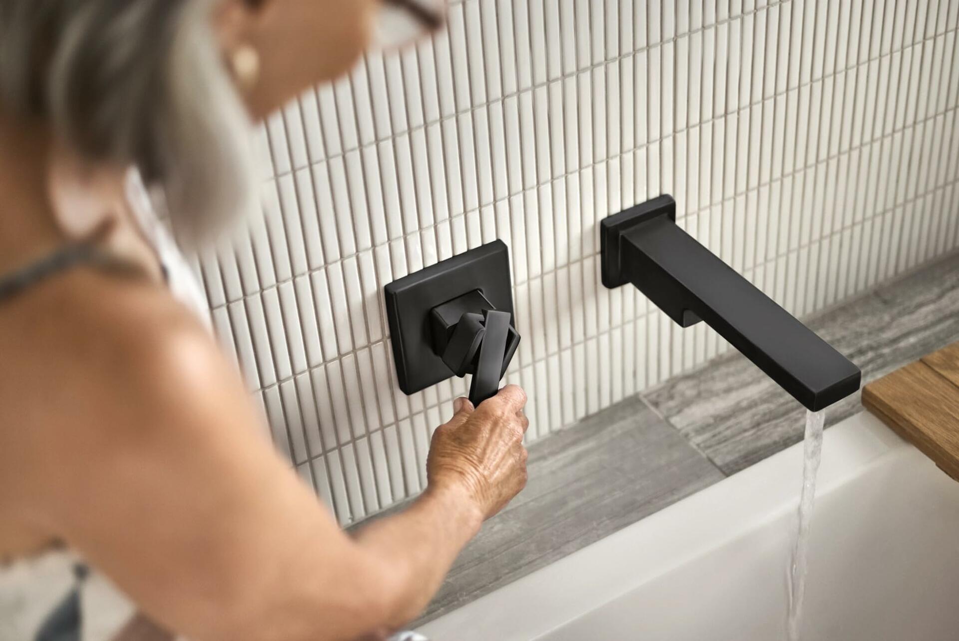 Moen 90 Degree Matte Black Single Handle Wall Mount Tub Filler High Flow Tub Faucet with 10" Spout Reach, WTS911BL
